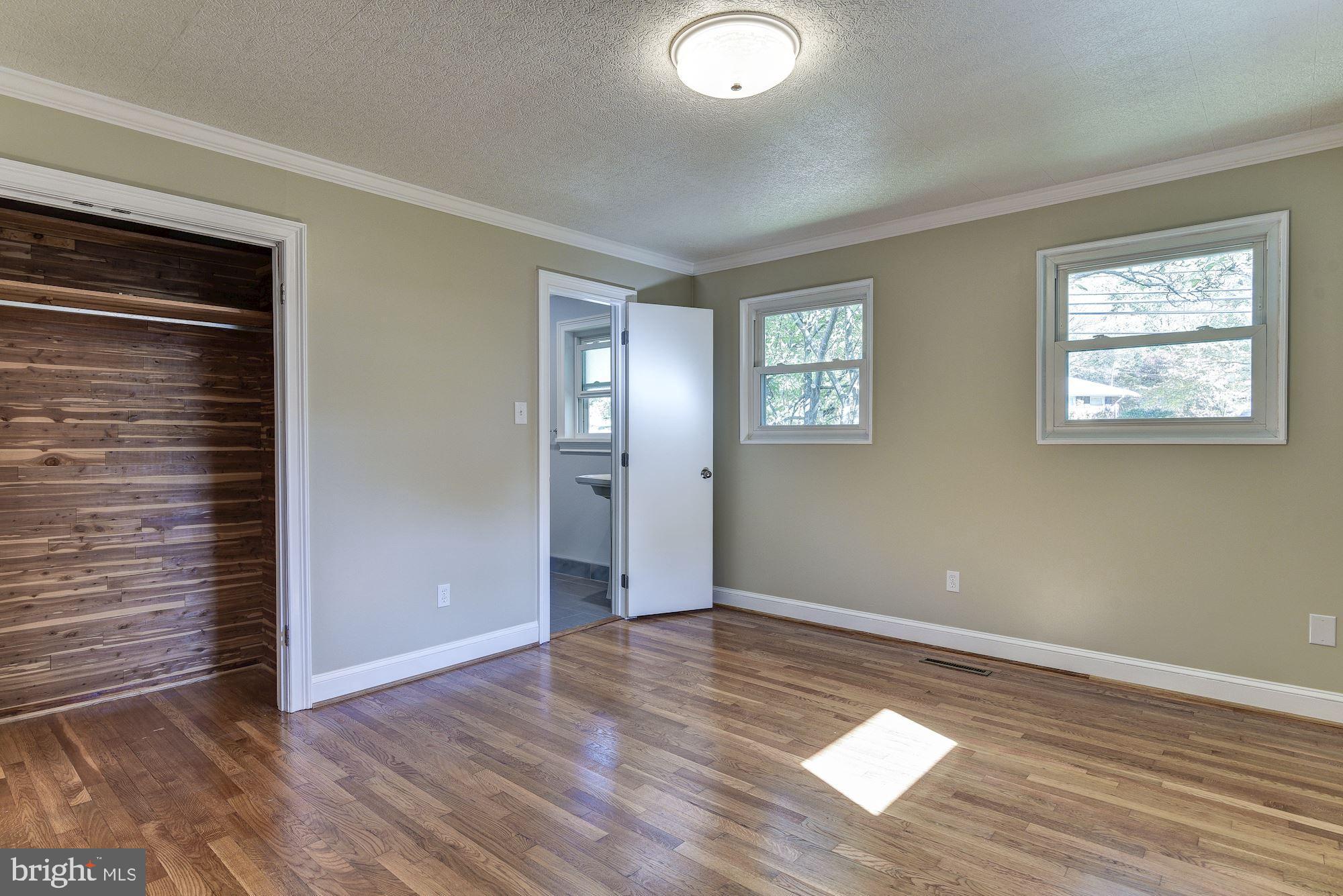 2300 Ross Road Silver Spring, MD 20910 - Photo 8 of 19 Master bedroom with full bath