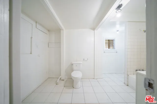 a bathroom with a toilet