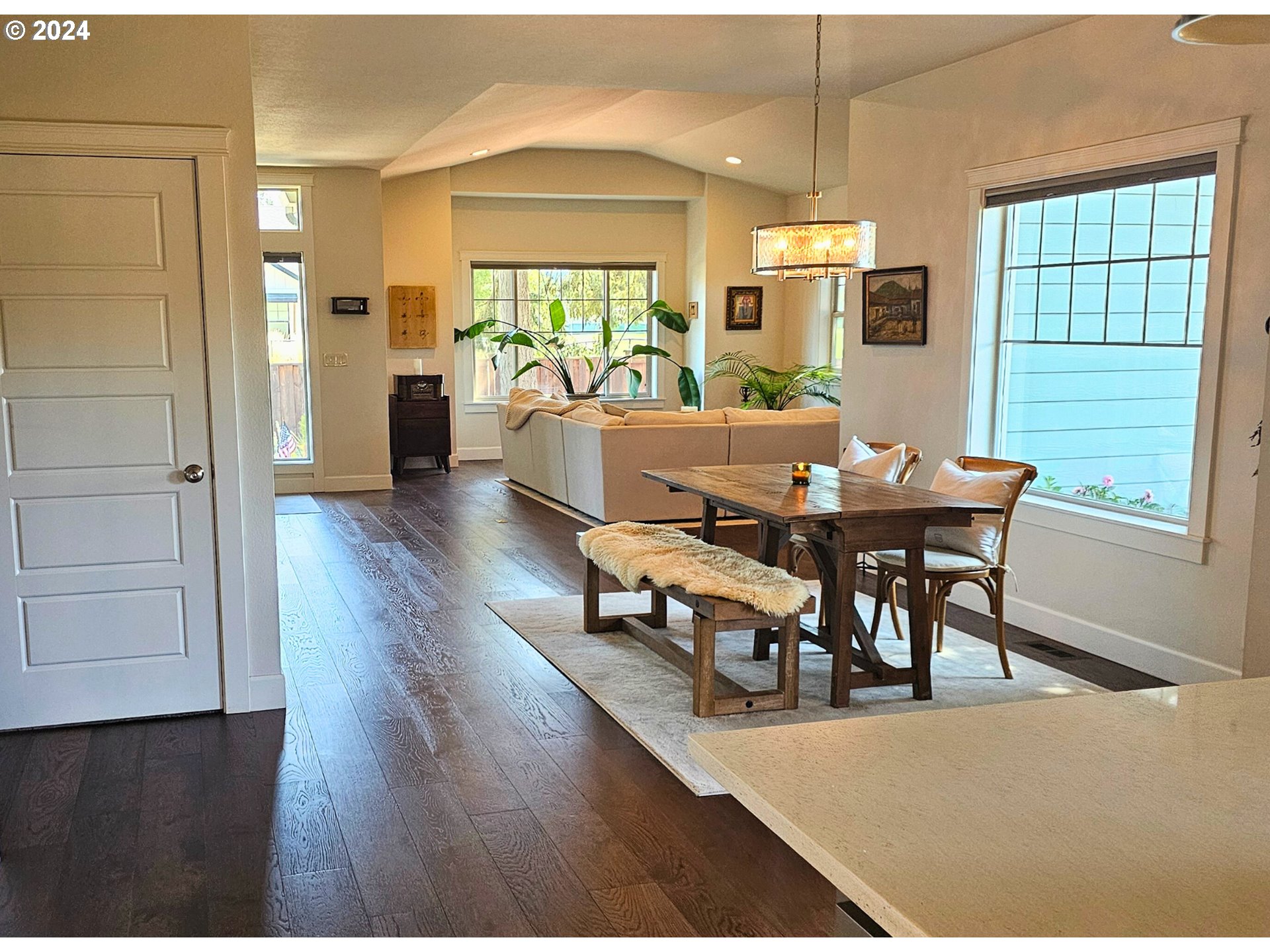 2230 Jeppesen Acres Road Eugene, OR 97401 - Photo 14 of 39 a view of a dining room with furniture window and wooden floor