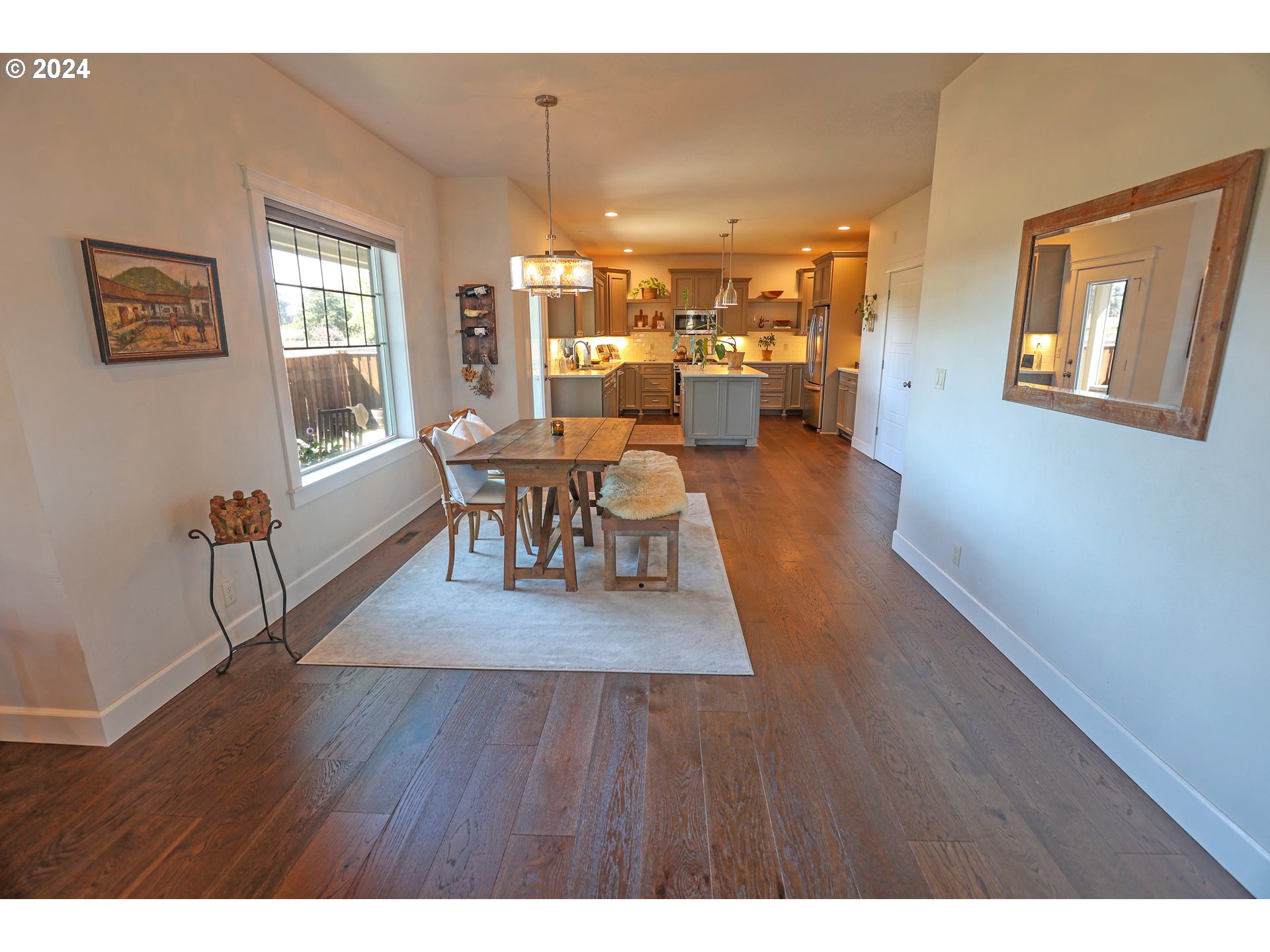 2230 Jeppesen Acres Road Eugene, OR 97401 - Photo 15 of 39 a view of a dining room with furniture and wooden floor