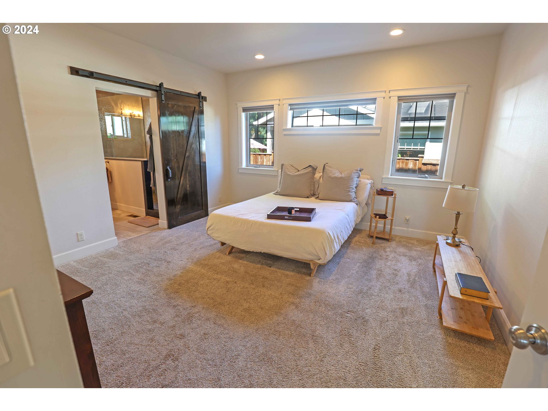2230 Jeppesen Acres Road Eugene, OR 97401 - Photo 17 of 39 a bedroom with a bed and window