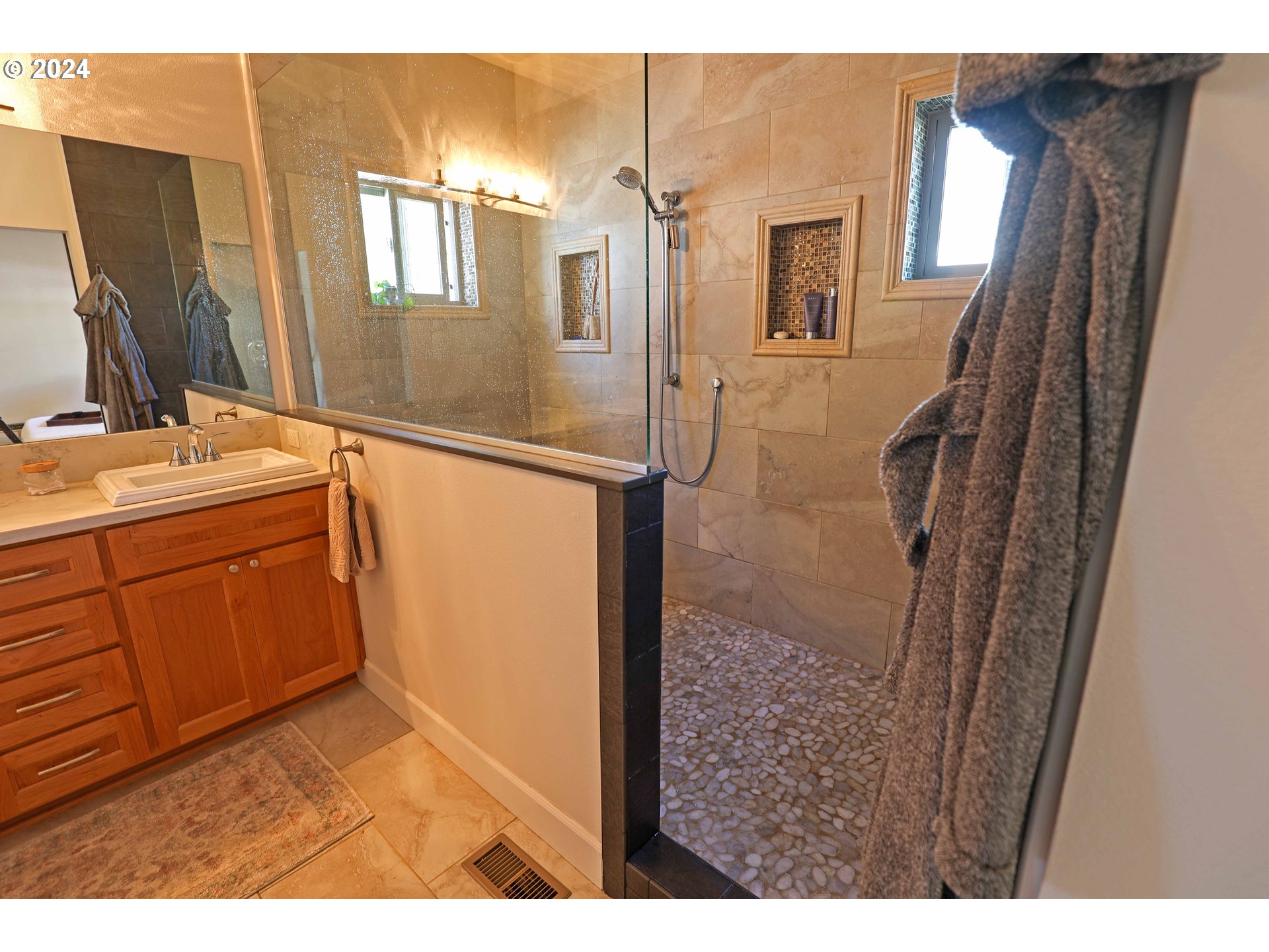2230 Jeppesen Acres Road Eugene, OR 97401 - Photo 18 of 39 a bathroom with a sink a toilet and shower