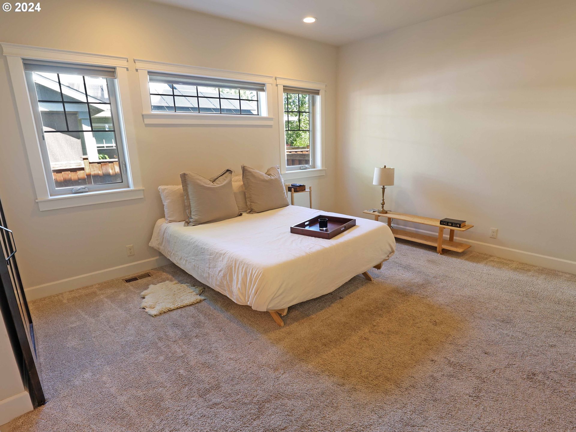 2230 Jeppesen Acres Road Eugene, OR 97401 - Photo 23 of 39 a bedroom with a bed and large window