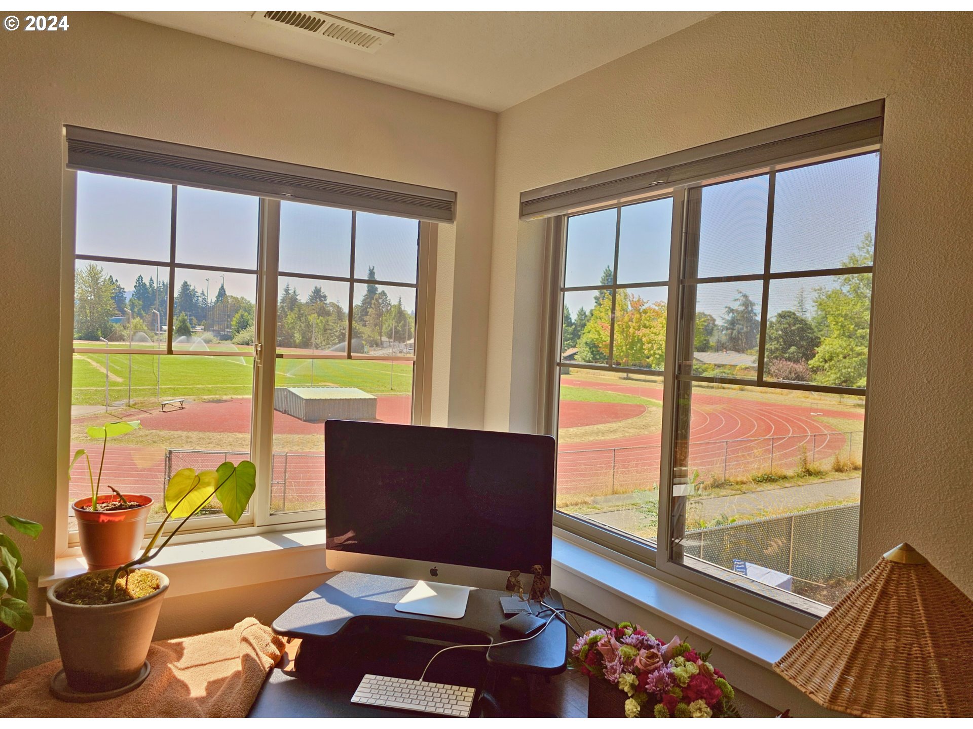 2230 Jeppesen Acres Road Eugene, OR 97401 - Photo 24 of 39 a living room with a table and a large window