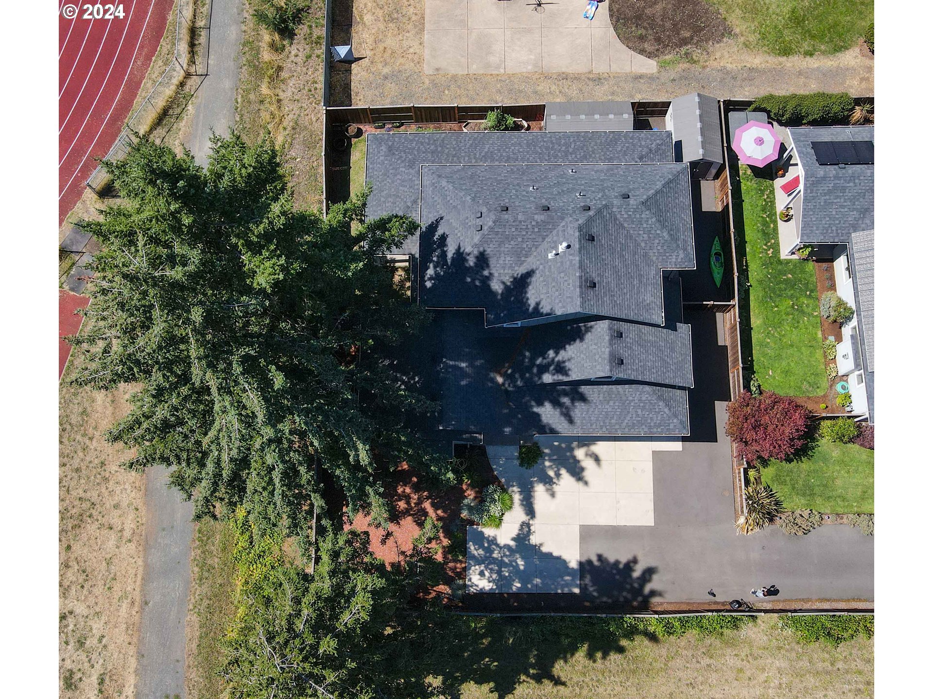 2230 Jeppesen Acres Road Eugene, OR 97401 - Photo 3 of 39 an aerial view of a house with a garden and lake view