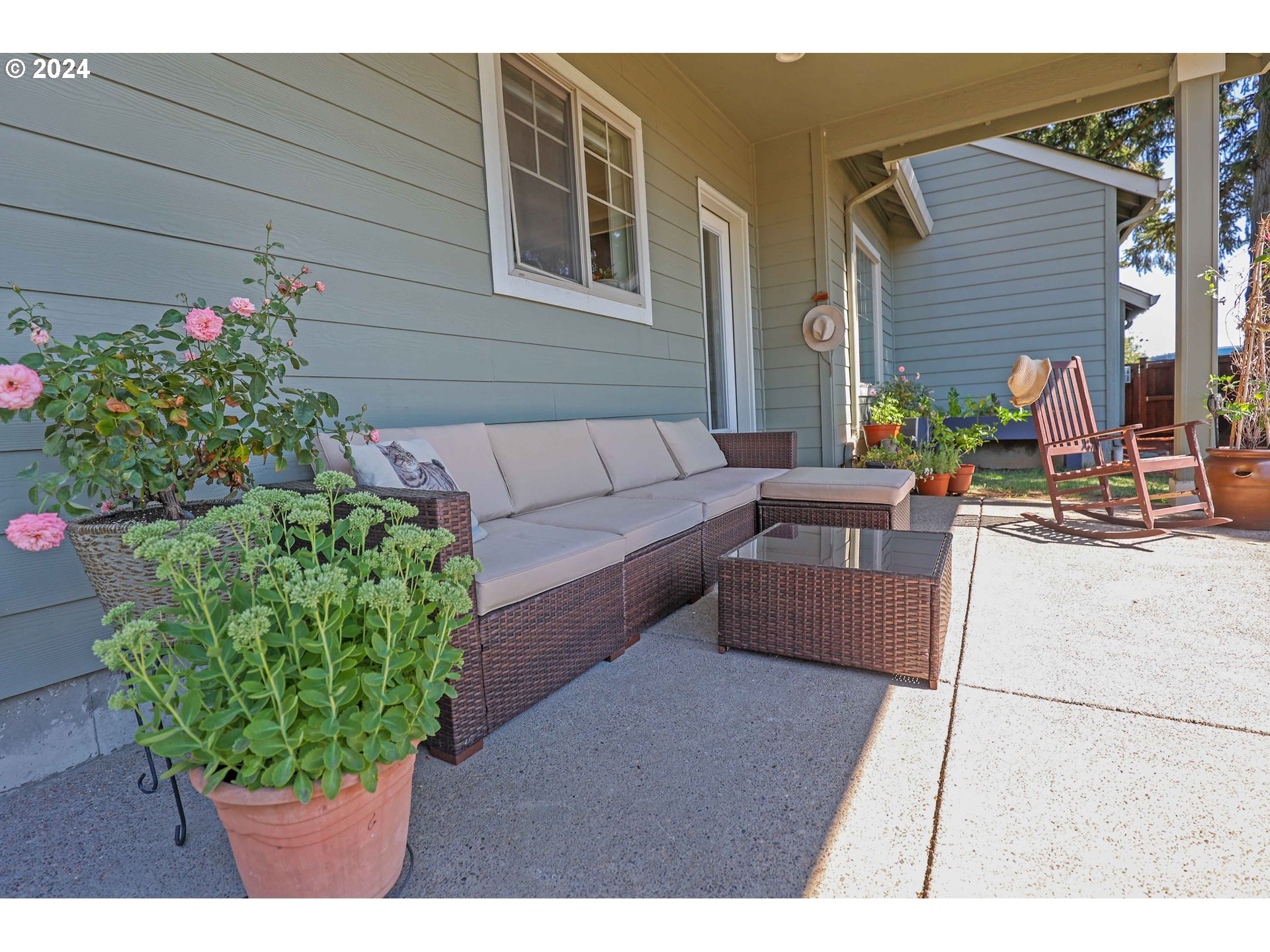 2230 Jeppesen Acres Road Eugene, OR 97401 - Photo 32 of 39 a view of a backyard with couches and potted plants