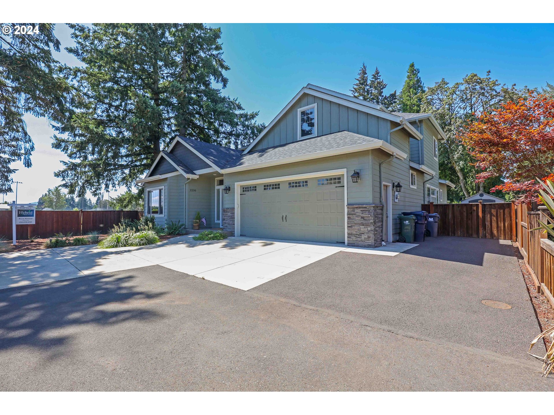 2230 Jeppesen Acres Road Eugene, OR 97401 - Photo 33 of 39 a view of a house with a yard and garage