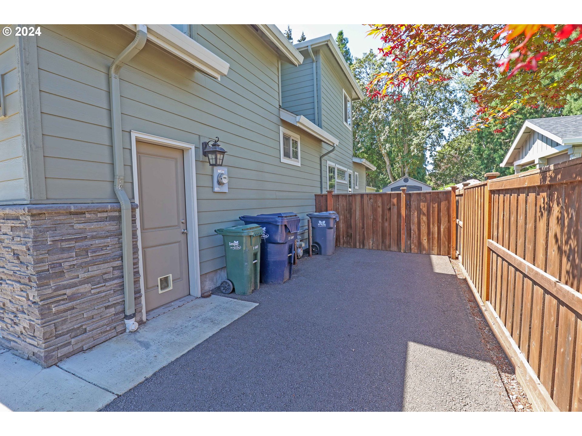 2230 Jeppesen Acres Road Eugene, OR 97401 - Photo 34 of 39 a view of a house with wooden fence