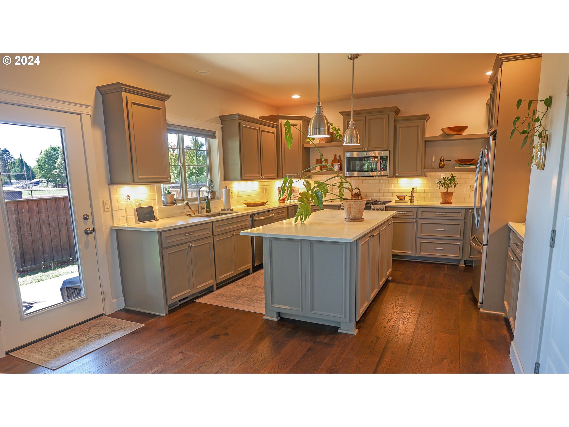 2230 Jeppesen Acres Road Eugene, OR 97401 - Photo 6 of 39 a open kitchen with a sink stove and cabinets