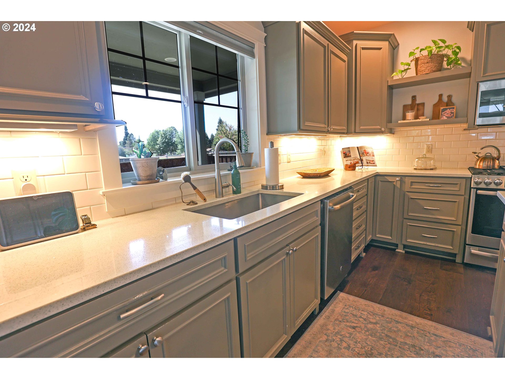 2230 Jeppesen Acres Road Eugene, OR 97401 - Photo 10 of 39 a kitchen with granite countertop a sink and a stove