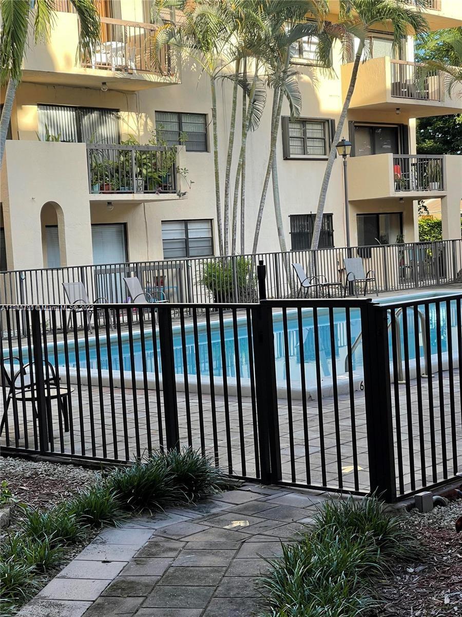 Westchester Miami, FL 33144 - Photo 2 of 9 a view of a brick house with a small yard