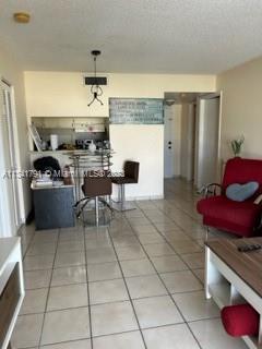 Westchester Miami, FL 33144 - Photo 5 of 9 a kitchen with stainless steel appliances kitchen island granite countertop a sink and cabinets