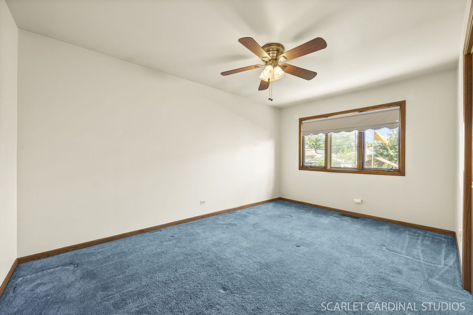 8214 45th Street Lyons, IL 60534 - Photo 12 of 24 an empty room with window and ceiling fan