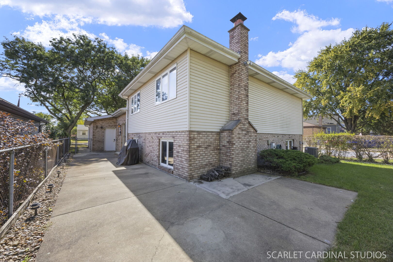 8214 45th Street Lyons, IL 60534 - Photo 20 of 24 a front view of a house with a yard and garage