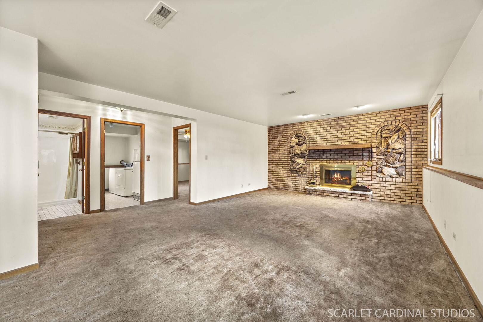 8214 45th Street Lyons, IL 60534 - Photo 7 of 24 a big room with closet and a fireplace