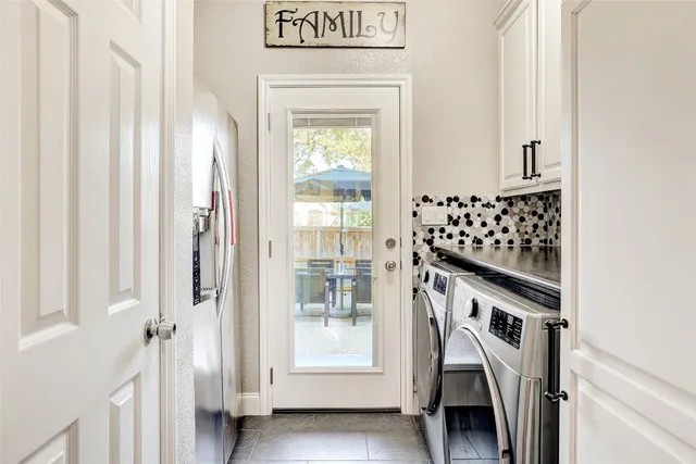 a bedroom with bed and wooden floor