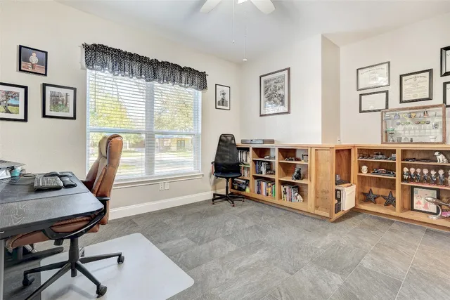 a room with furniture and flat screen tv
