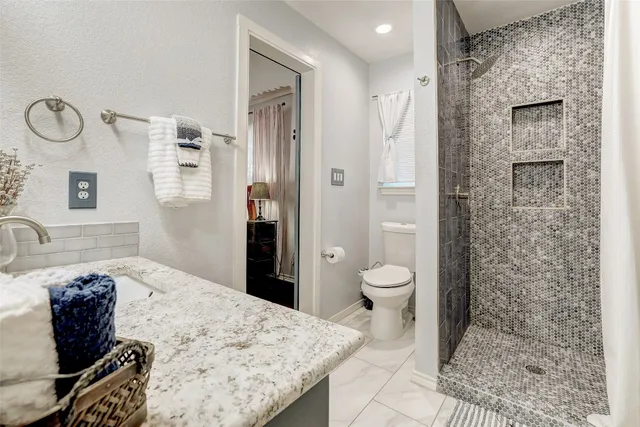 a room with a bed and a window