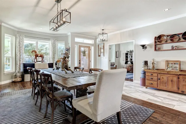 a living room with furniture a rug and a window