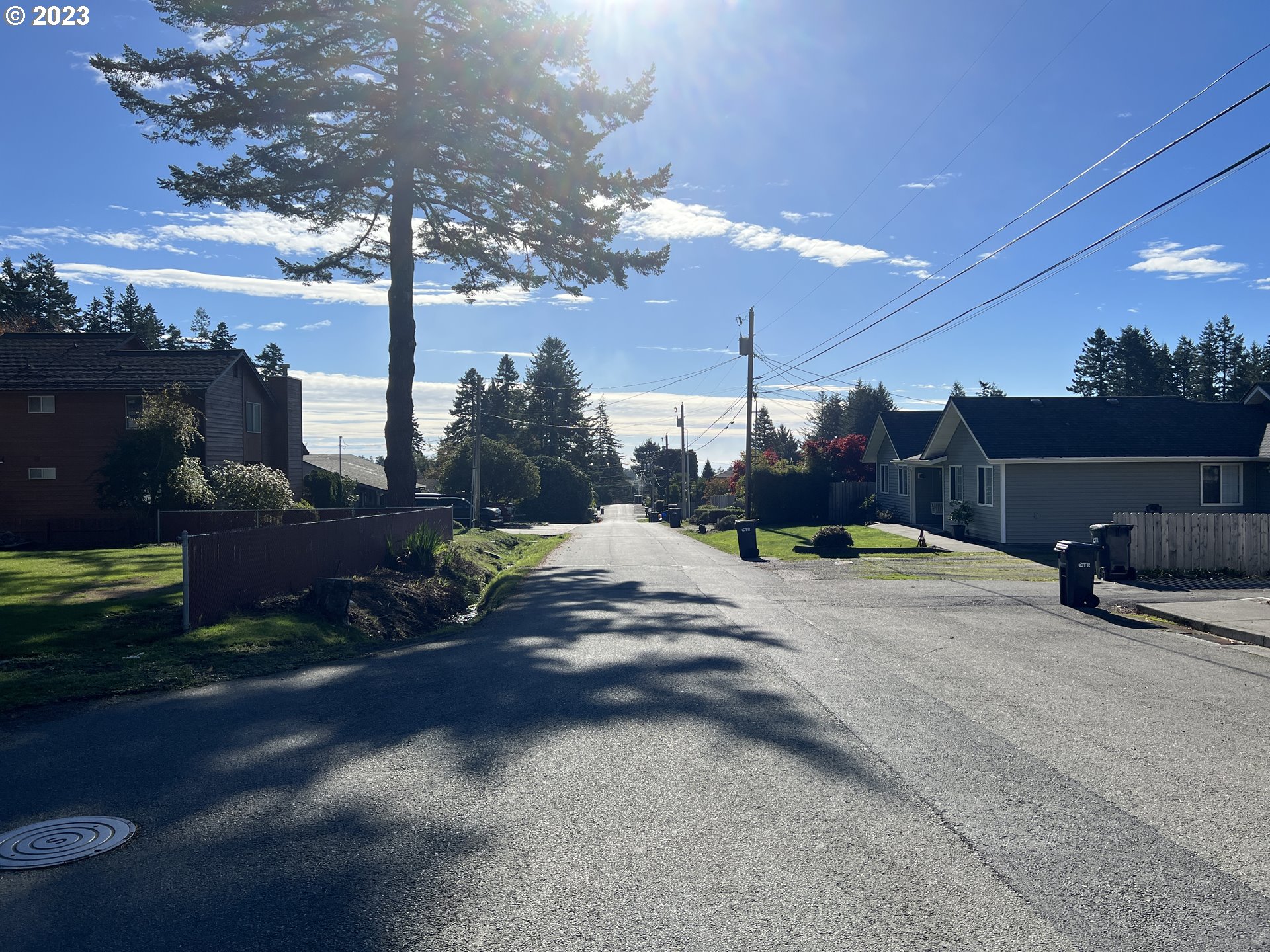 Meadow Lane Brookings, OR 97415 - Photo 12 of 13 a view of a house with a yard