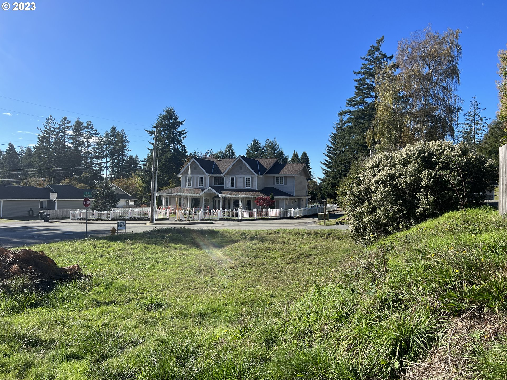 Meadow Lane Brookings, OR 97415 - Photo 5 of 13 a view of a swimming pool with a garden