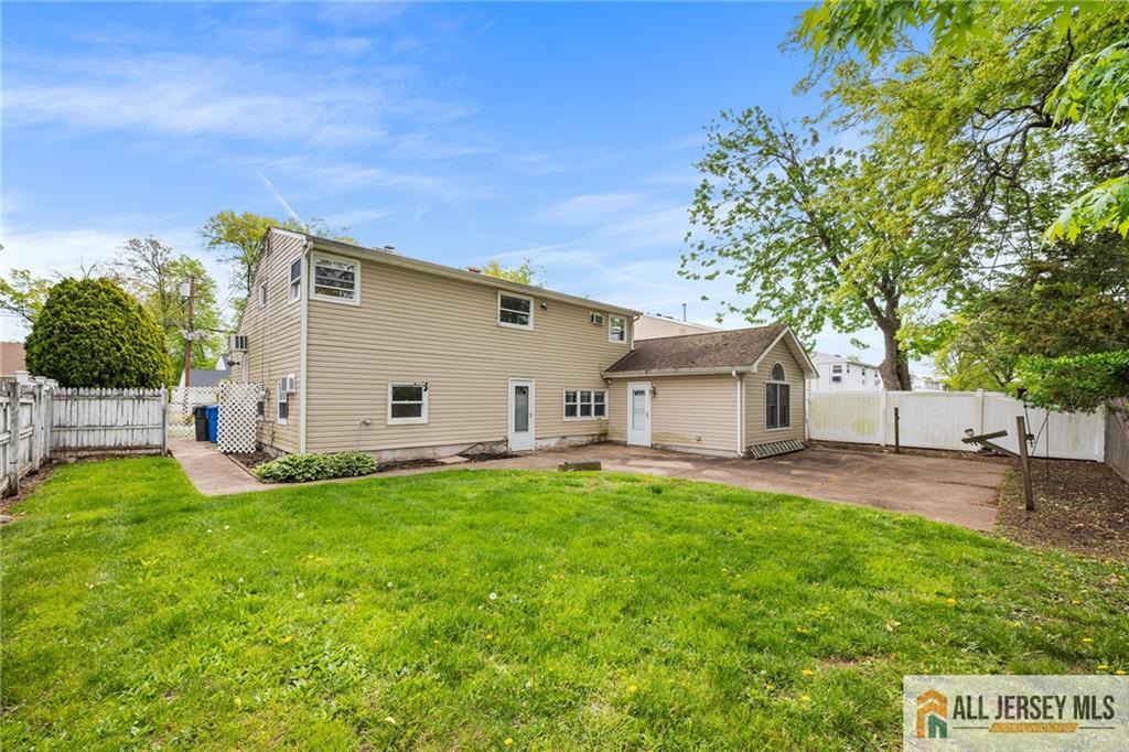 67 Drake Place Colonia, NJ 07067 - Photo 29 of 31 a view of a house with a yard and tree s