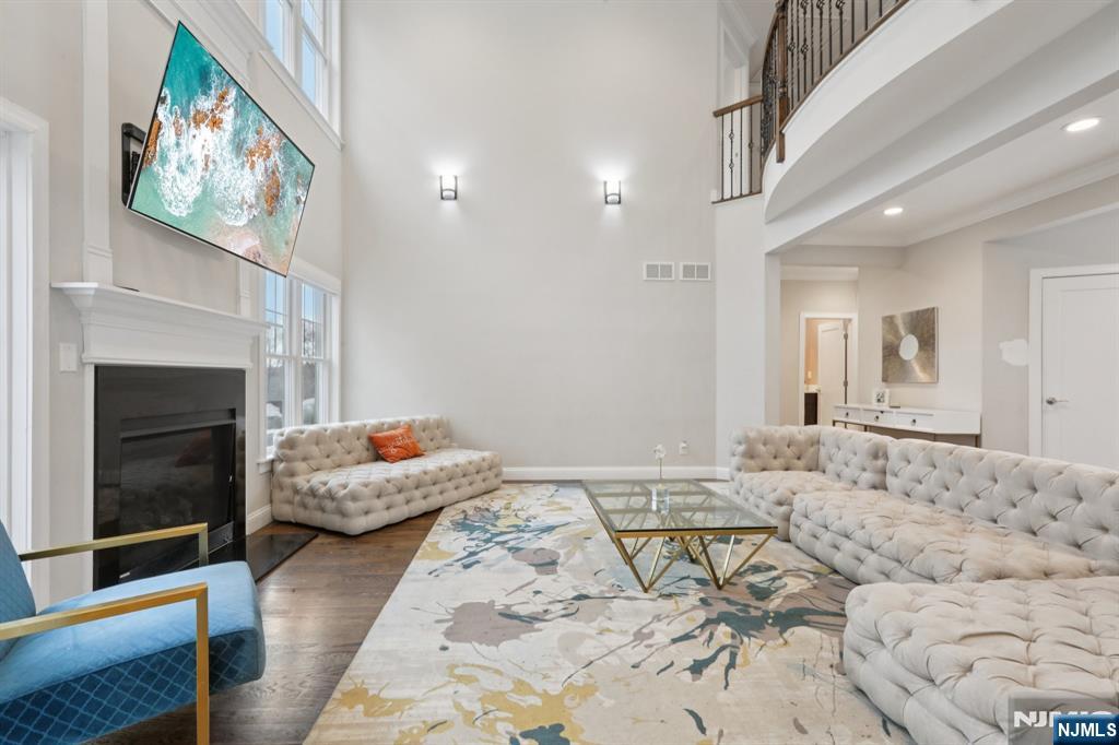 680 Soldier Hill Road Oradell, NJ 07649 - Photo 13 of 47 a bedroom with furniture and a fireplace