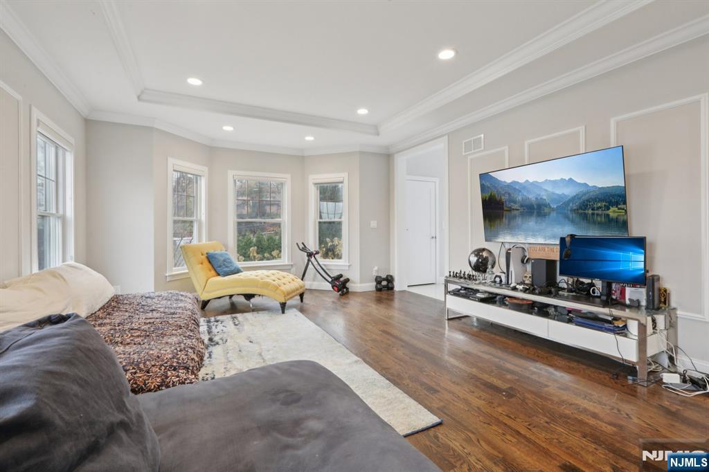 680 Soldier Hill Road Oradell, NJ 07649 - Photo 15 of 47 a living room with furniture and a flat screen tv