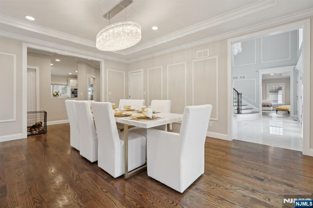 680 Soldier Hill Road Oradell, NJ 07649 - Photo 18 of 47 a view of a dining room with furniture and wooden floor