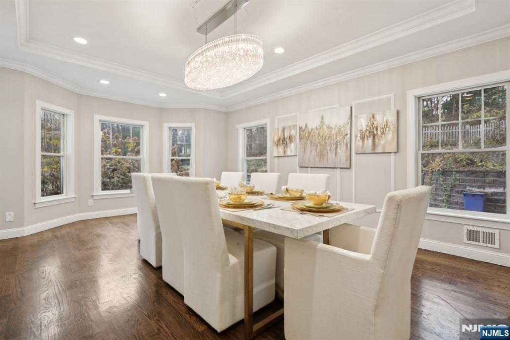 680 Soldier Hill Road Oradell, NJ 07649 - Photo 19 of 47 a view of a dining room with furniture window and wooden floor