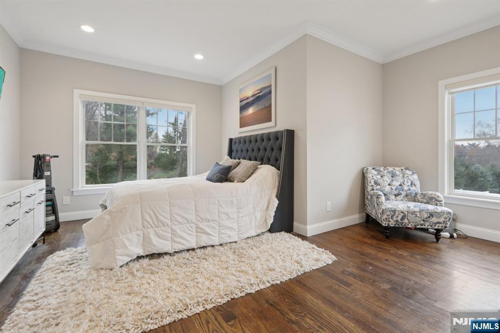 680 Soldier Hill Road Oradell, NJ 07649 - Photo 35 of 47 a bedroom with a bed and wooden floor
