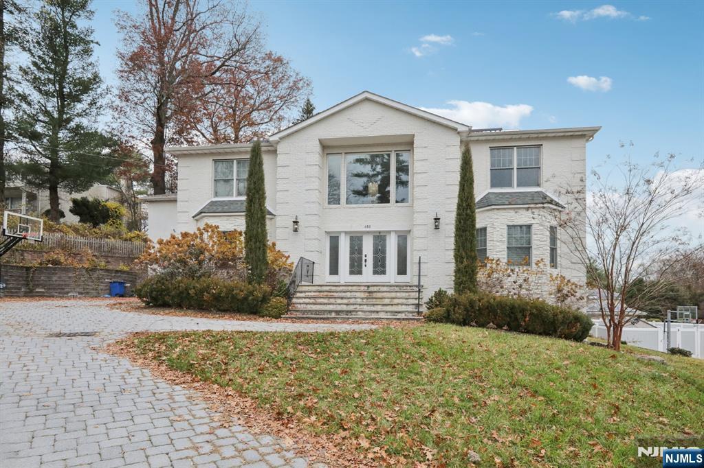 680 Soldier Hill Road Oradell, NJ 07649 - Photo 47 of 47 a view of a house with a yard and large tree
