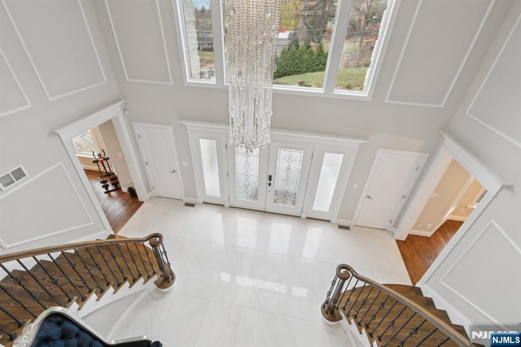 680 Soldier Hill Road Oradell, NJ 07649 - Photo 7 of 47 a view of a livingroom with furniture and stairs