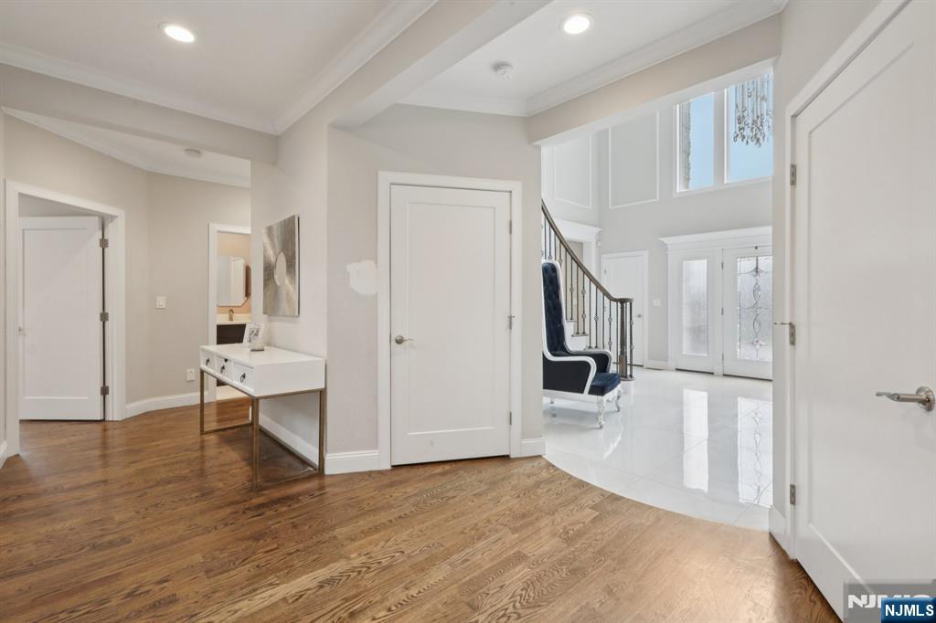 680 Soldier Hill Road Oradell, NJ 07649 - Photo 8 of 47 a view of a living room with furniture and wooden floor