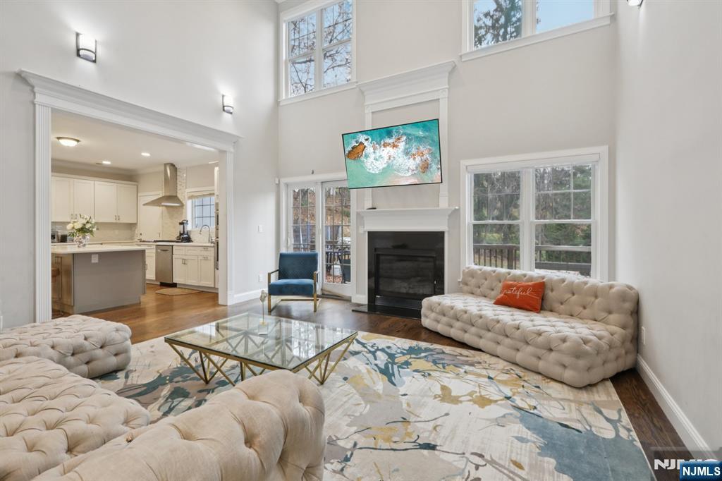 680 Soldier Hill Road Oradell, NJ 07649 - Photo 10 of 47 a living room with furniture and a fireplace