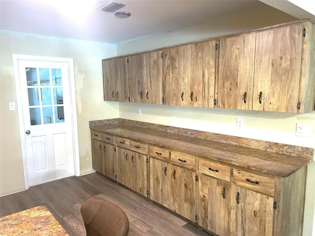 8655 Southwest 98th Street Road, Unit A Ocala, FL 34481 - Photo 15 of 24 Large area in kitchen for additional counter space and storage