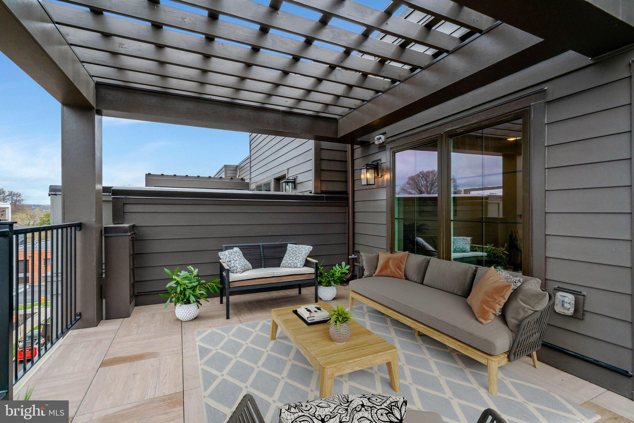 2605 Fall Line Street Alexandria, VA 22301 - Photo 1 of 71 a outdoor living space with patio furniture and garden view