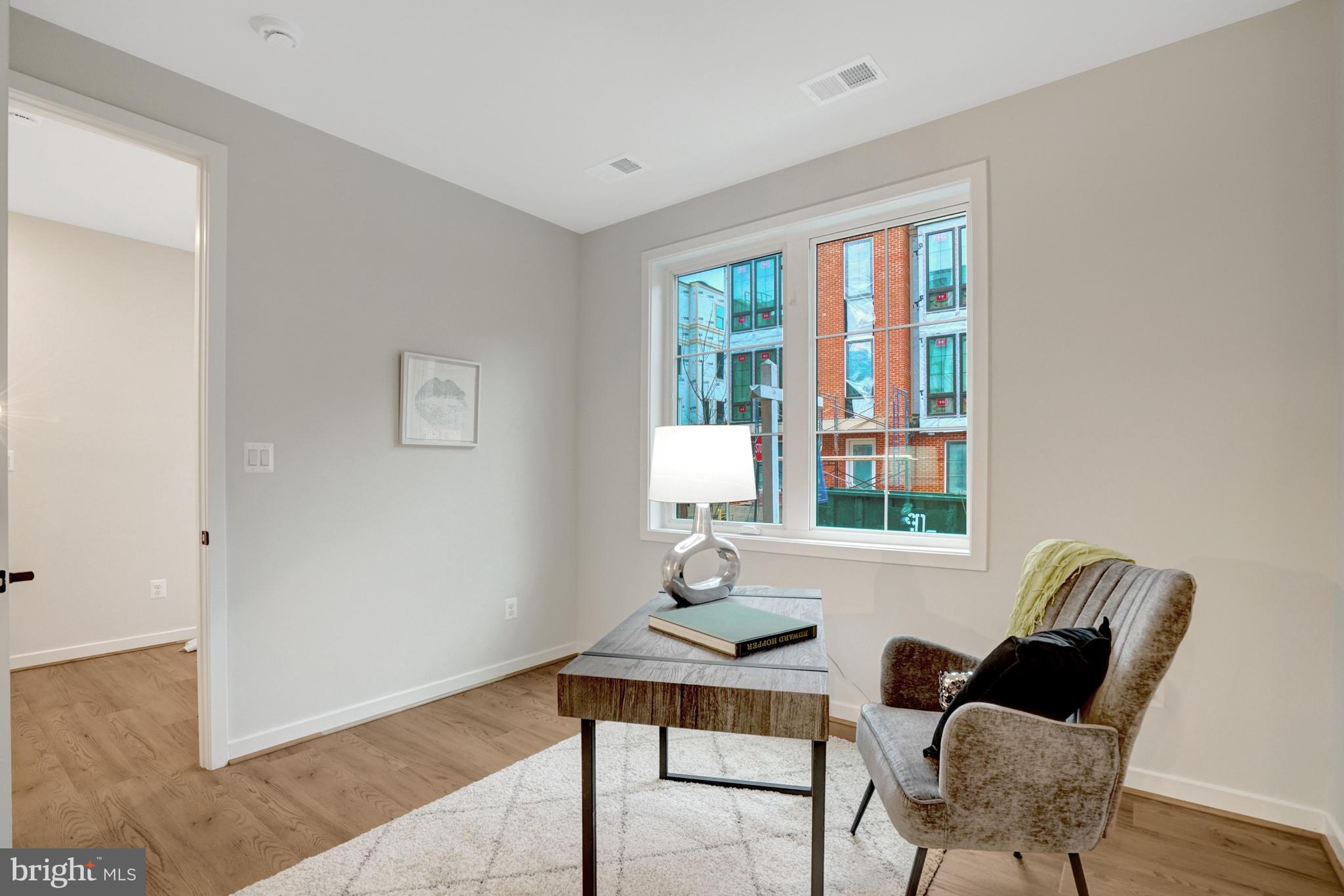 2605 Fall Line Street Alexandria, VA 22301 - Photo 14 of 71 a view of a livingroom with lounge chair and a window