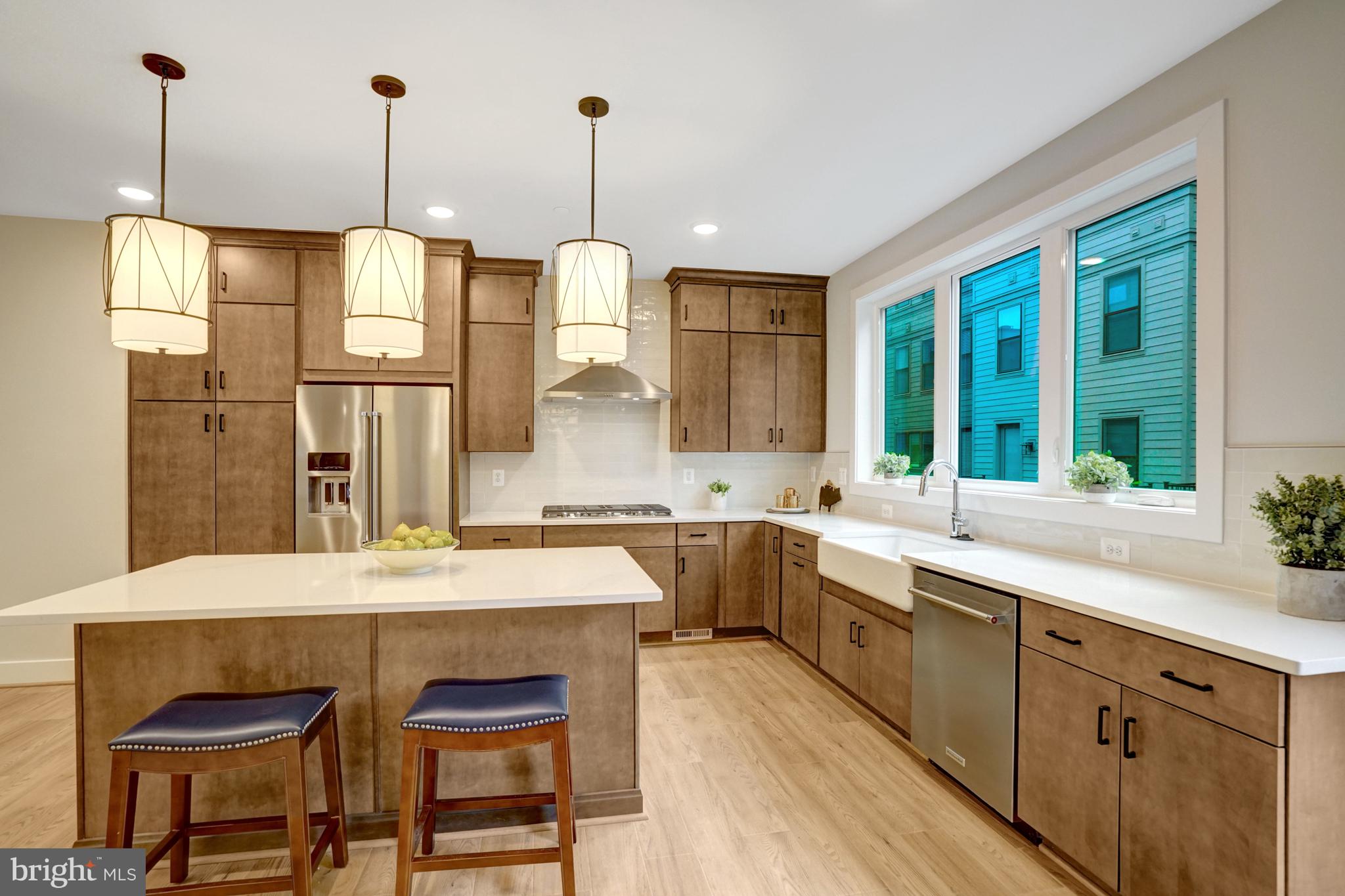 2605 Fall Line Street Alexandria, VA 22301 - Photo 32 of 71 a large kitchen with granite countertop a sink and counter space