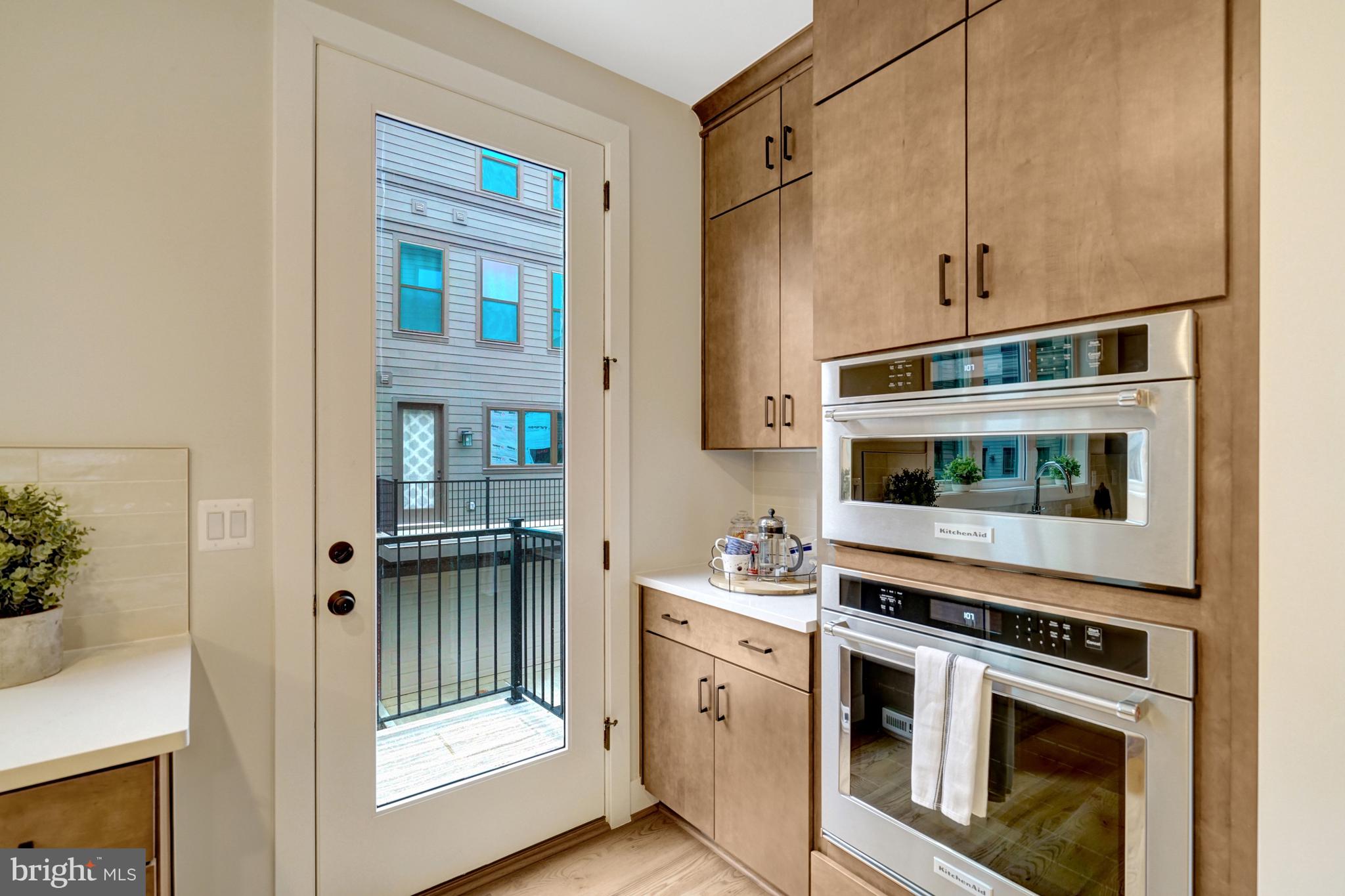 2605 Fall Line Street Alexandria, VA 22301 - Photo 38 of 71 a kitchen with stainless steel appliances a stove and a microwave