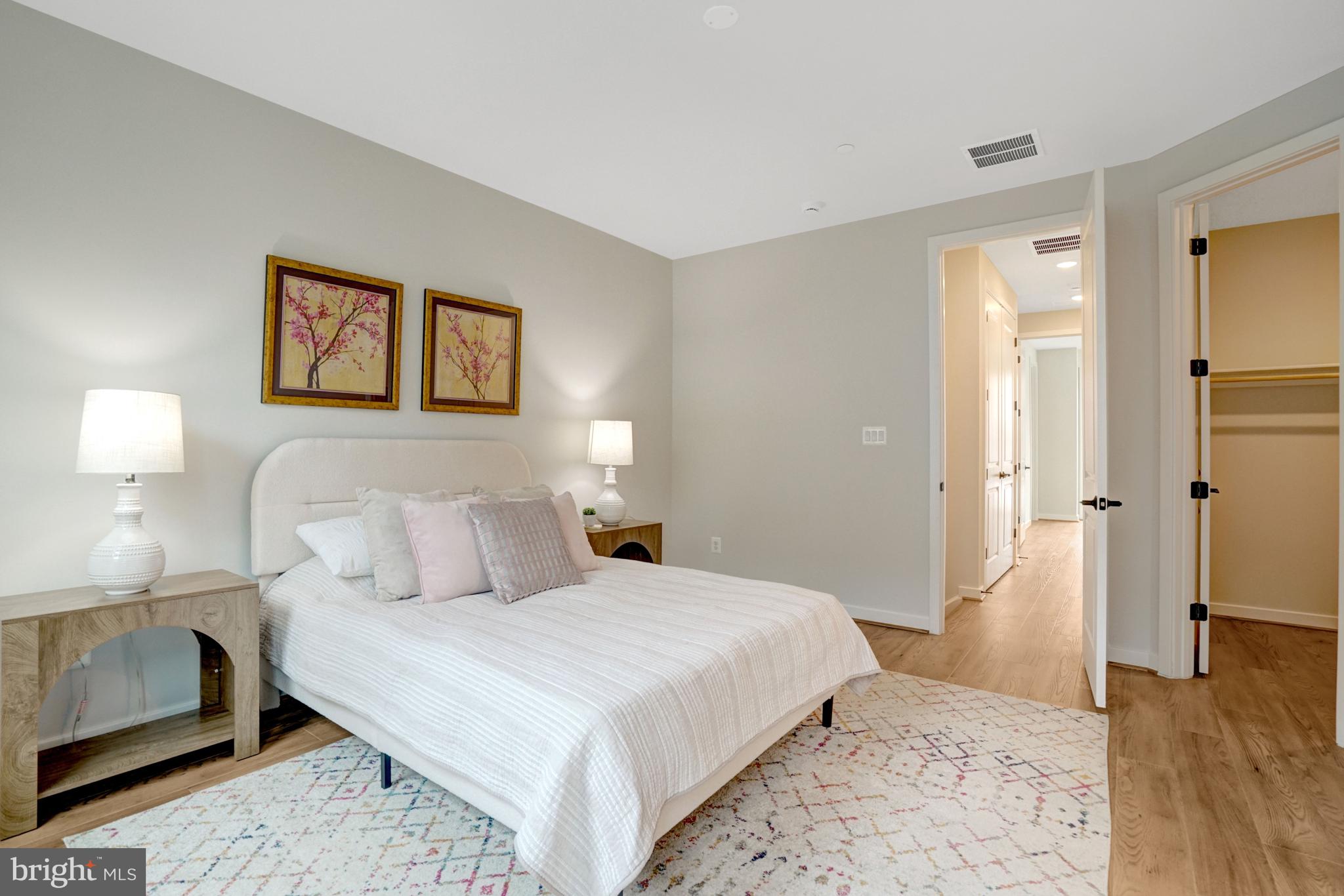 2605 Fall Line Street Alexandria, VA 22301 - Photo 54 of 71 a bedroom with a bed and wooden floor