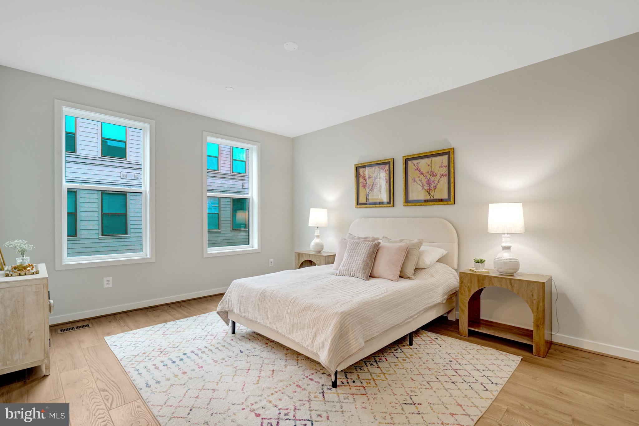 2605 Fall Line Street Alexandria, VA 22301 - Photo 55 of 71 a bedroom with a bed and wooden floor