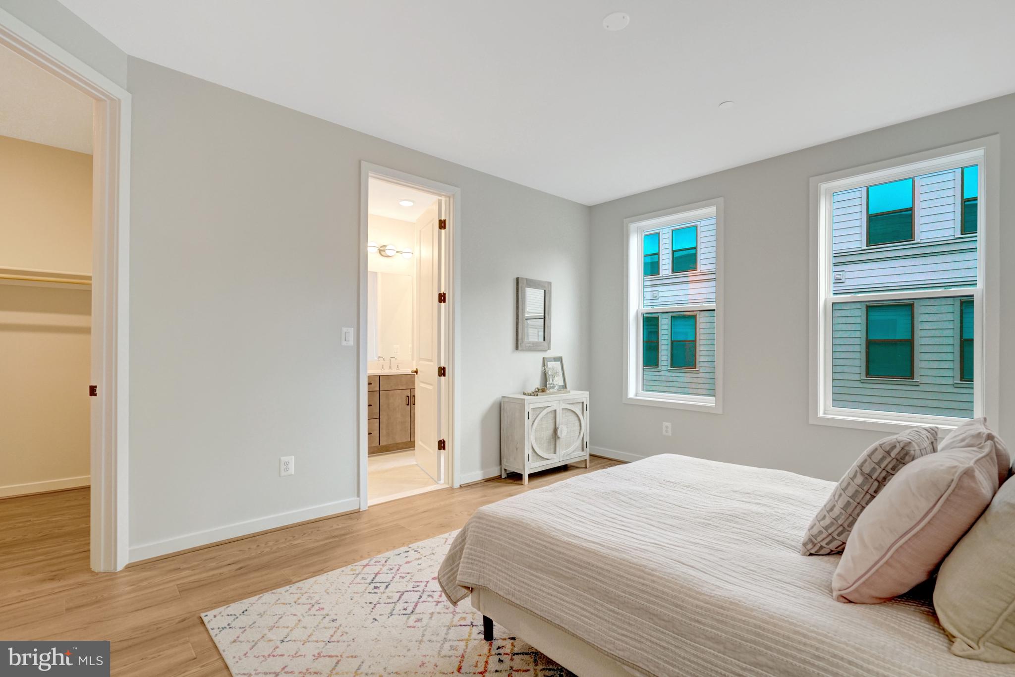 2605 Fall Line Street Alexandria, VA 22301 - Photo 61 of 71 a bedroom with a bed and wooden floor