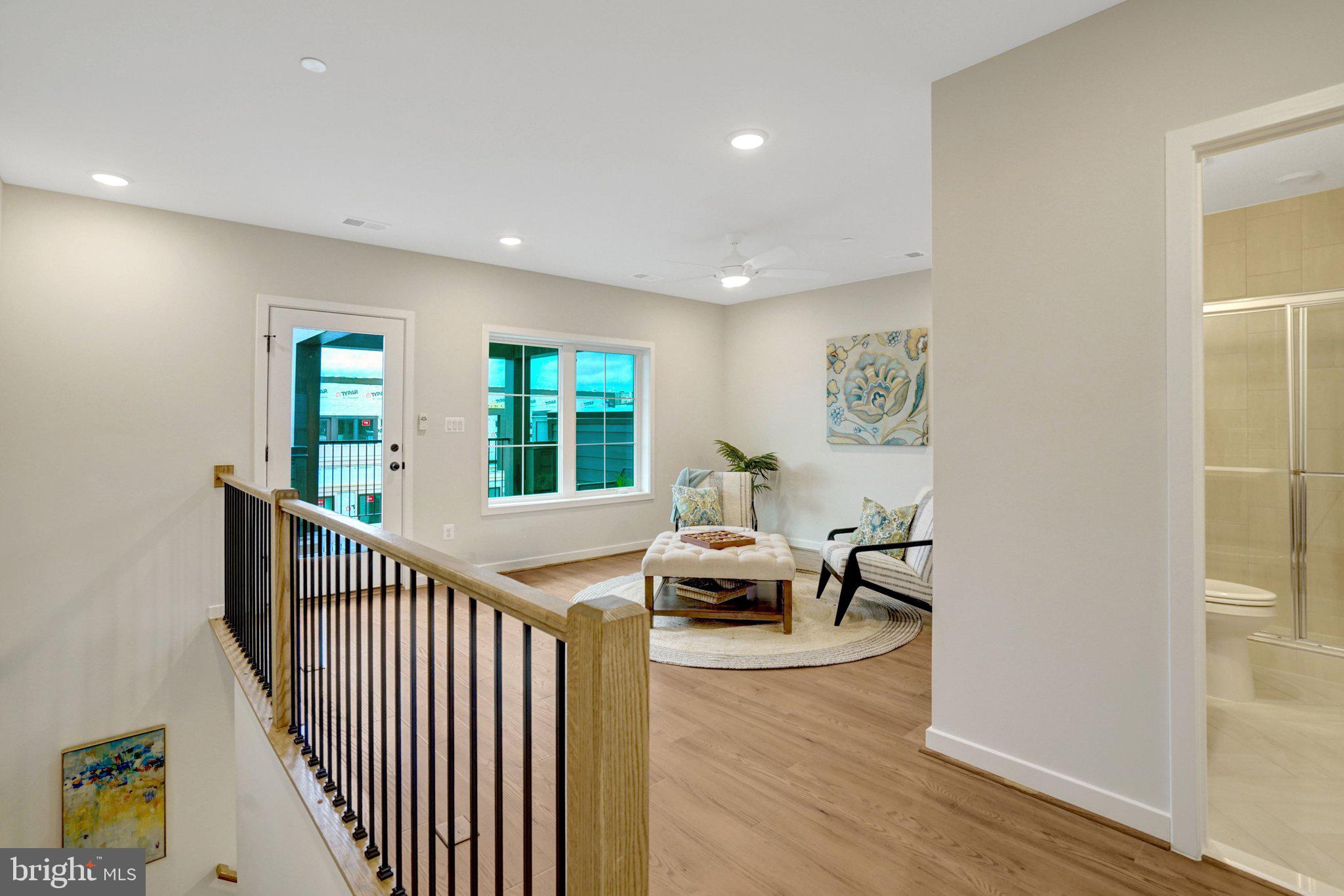2605 Fall Line Street Alexandria, VA 22301 - Photo 65 of 71 a view of dining room with furniture wooden floor and windows