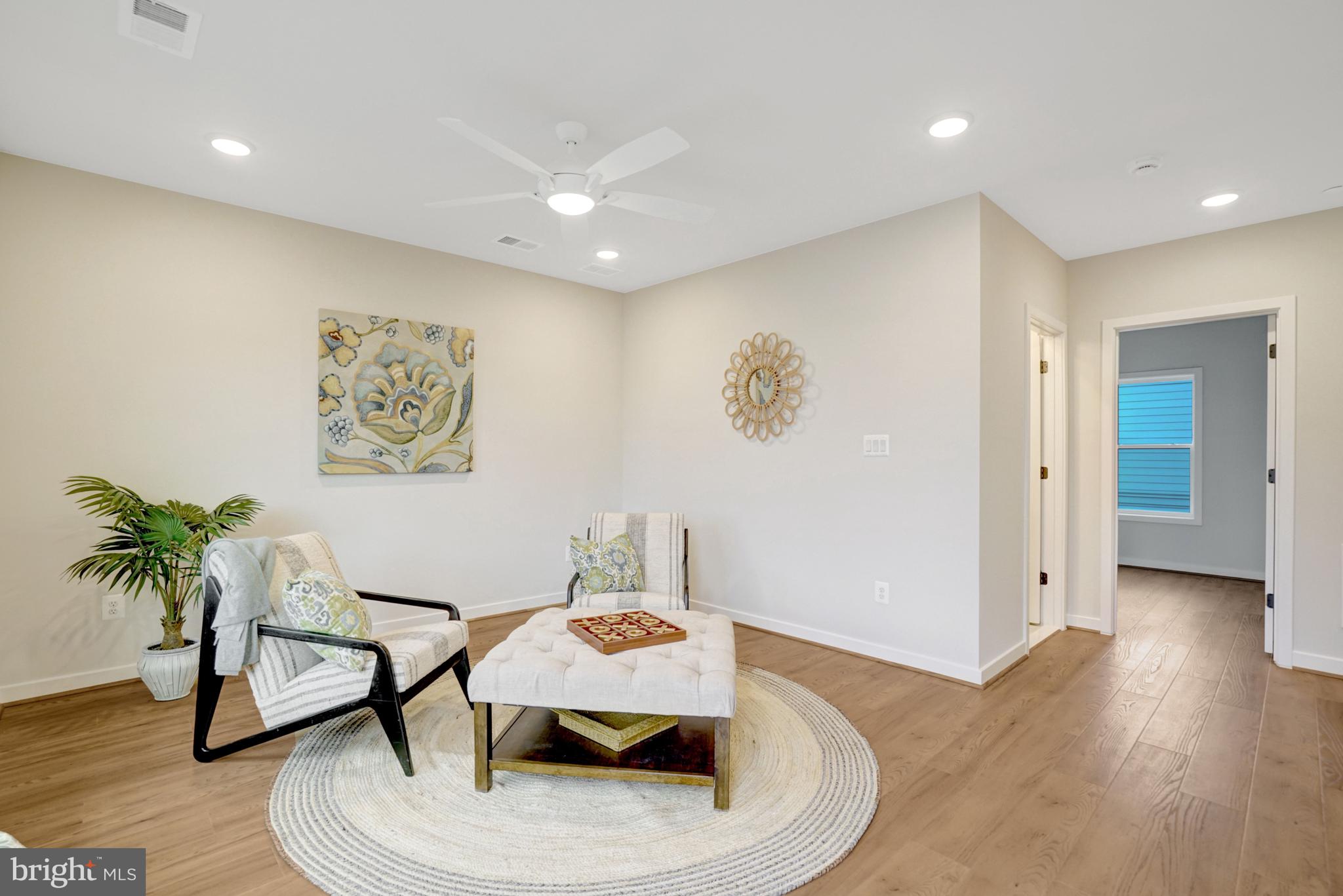 2605 Fall Line Street Alexandria, VA 22301 - Photo 67 of 71 a living room with furniture and a potted plant