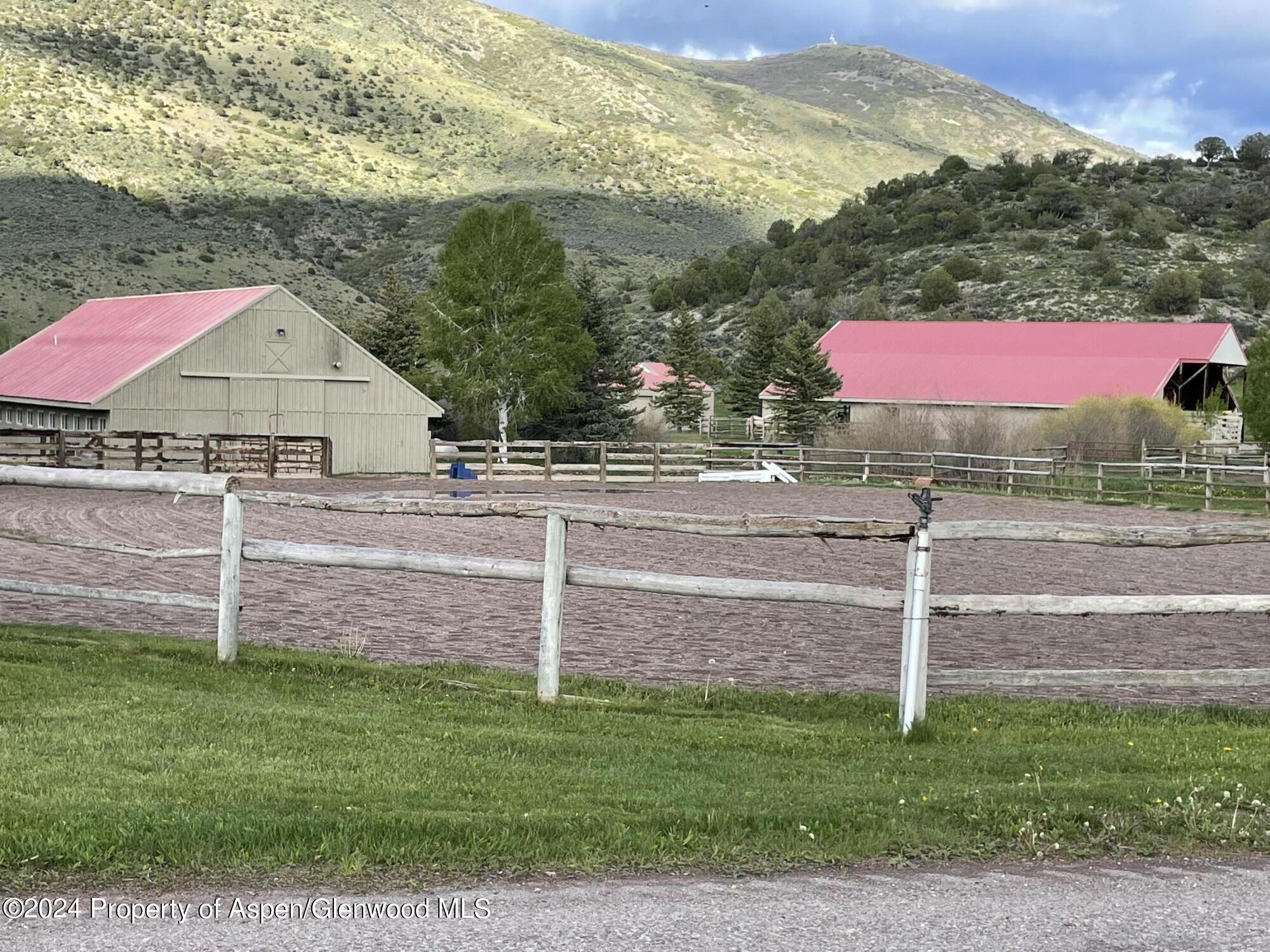 0 Lazy O Road, Unit LOT #4 Snowmass, CO 81654 - Photo 13 of 25 a view of a yard with a house