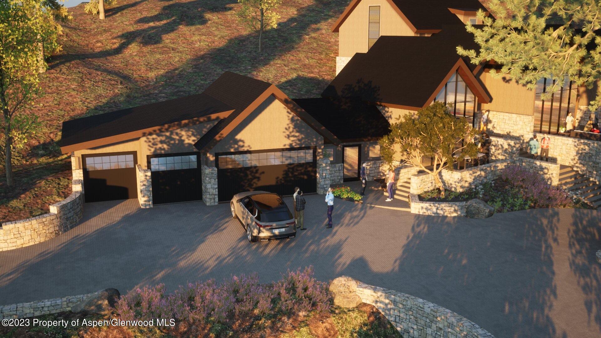 0 Lazy O Road, Unit LOT #4 Snowmass, CO 81654 - Photo 22 of 25 a backyard of a house with table and chairs under an umbrella