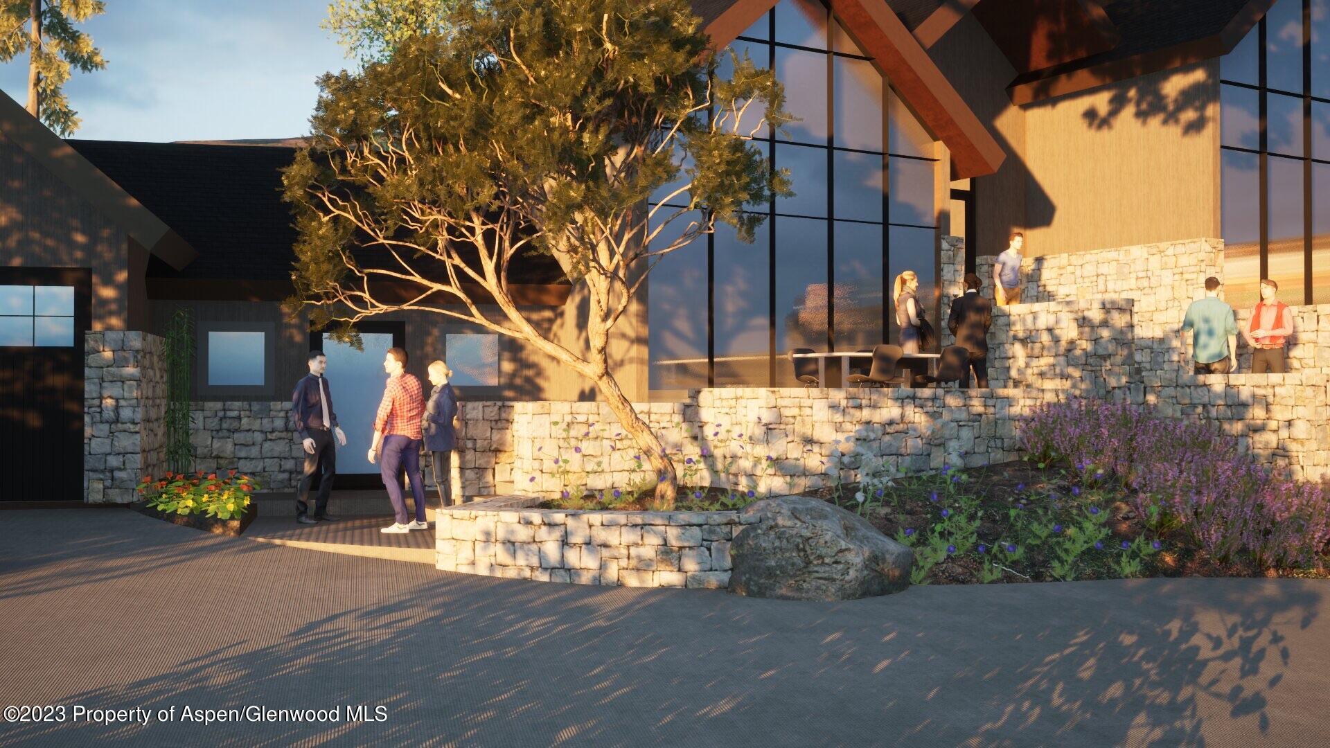 0 Lazy O Road, Unit LOT #4 Snowmass, CO 81654 - Photo 24 of 25 a view of a brick buildings with a street