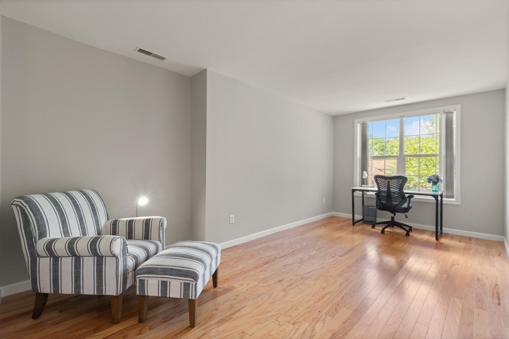 27 Brook Lane, Unit 27 Berlin, MA 01503 - Photo 26 of 36 a workspace with furniture and a window