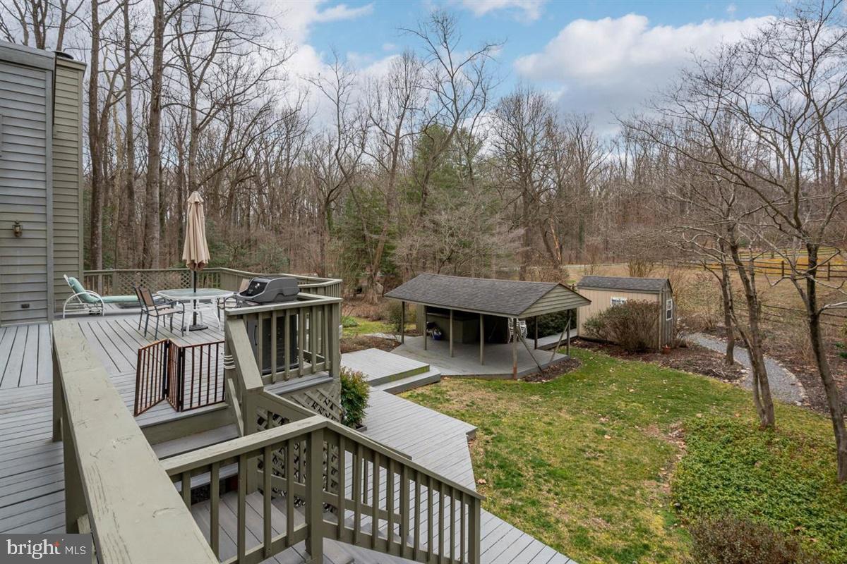 1937 High Ridge Road Annapolis, MD 21409 - Photo 31 of 64 Multiple decks with a hot tub-county space on side